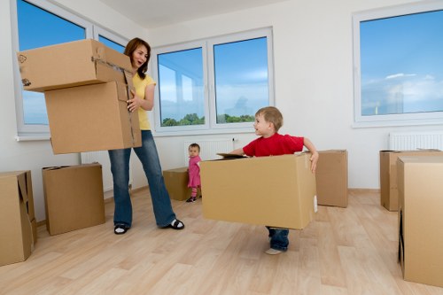 Moving boxes and household items prepared for transport in Forestdale