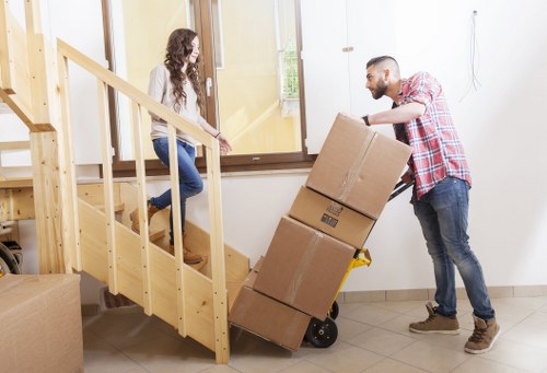 Furniture and household items being loaded for a Forestdale relocation