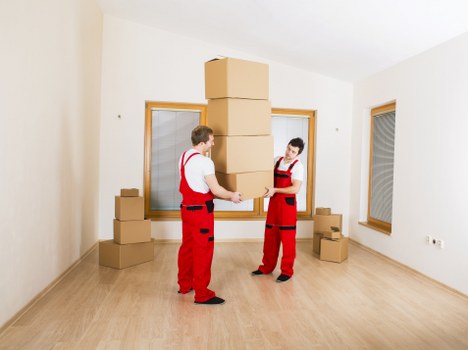 Commercial movers relocating office equipment in Forestdale